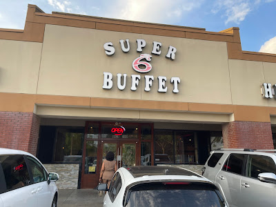Asian buffet dish selection at Super 6 Buffet